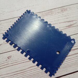 Espátula dentada para esgrafiar